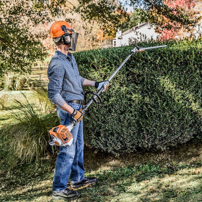 How to Trim Tall Hedges Safely With an Adjustable Trimmer